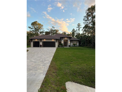 NEW CONSTRUCTION | GOLDEN GATE ESTATES | NAPLES Discover this on The Club At Twin Eagles in Florida - for sale on GolfHomes.com, golf home, golf lot