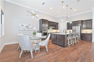 Elegant 4-Bedroom + Den Estate with Heated Pool, Extended 3-Car on Old Corkscrew Golf Club in Florida - for sale on GolfHomes.com, golf home, golf lot