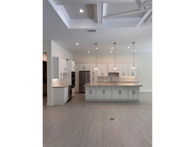 NEW CONSTRUCTION | GOLDEN GATE ESTATES | NAPLES Discover this on The Club At Twin Eagles in Florida - for sale on GolfHomes.com, golf home, golf lot