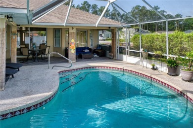 Experience refined Florida living in this meticulously on The Grand Club - Pine Lakes Course in Florida - for sale on GolfHomes.com, golf home, golf lot