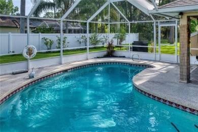 Experience refined Florida living in this meticulously on The Grand Club - Pine Lakes Course in Florida - for sale on GolfHomes.com, golf home, golf lot