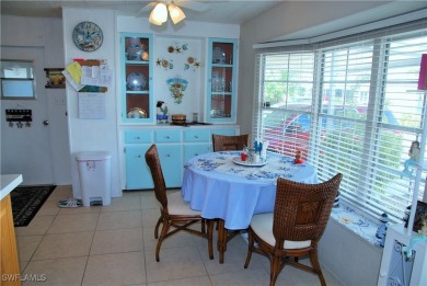 This move-in ready home, located along the tranquil perimeter of on Six Lakes Country Club in Florida - for sale on GolfHomes.com, golf home, golf lot