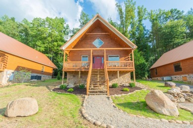 Nestled within the tranquil expanse of the Great Smoky Mountains on Bent Creek Golf Course in Tennessee - for sale on GolfHomes.com, golf home, golf lot