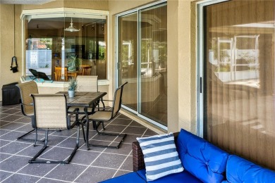 Experience refined Florida living in this meticulously on The Grand Club - Pine Lakes Course in Florida - for sale on GolfHomes.com, golf home, golf lot