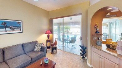 Experience refined Florida living in this meticulously on The Grand Club - Pine Lakes Course in Florida - for sale on GolfHomes.com, golf home, golf lot