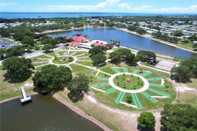 Looks like a Model Beautiful 2018 Jacobsen on highly desired on Barefoot Bay Golf Course in Florida - for sale on GolfHomes.com, golf home, golf lot