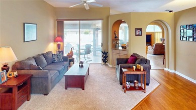 Experience refined Florida living in this meticulously on The Grand Club - Pine Lakes Course in Florida - for sale on GolfHomes.com, golf home, golf lot