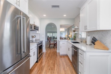 Welcome to this charming home in the sought-after gated on Herons Glen Golf and Country Club in Florida - for sale on GolfHomes.com, golf home, golf lot