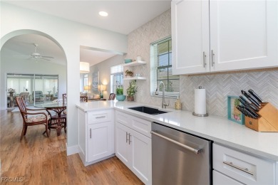Welcome to this charming home in the sought-after gated on Herons Glen Golf and Country Club in Florida - for sale on GolfHomes.com, golf home, golf lot