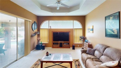 Experience refined Florida living in this meticulously on The Grand Club - Pine Lakes Course in Florida - for sale on GolfHomes.com, golf home, golf lot
