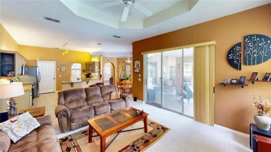 Experience refined Florida living in this meticulously on The Grand Club - Pine Lakes Course in Florida - for sale on GolfHomes.com, golf home, golf lot