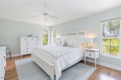 Welcome to this charming home in the sought-after gated on Herons Glen Golf and Country Club in Florida - for sale on GolfHomes.com, golf home, golf lot