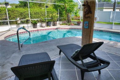 Experience refined Florida living in this meticulously on The Grand Club - Pine Lakes Course in Florida - for sale on GolfHomes.com, golf home, golf lot