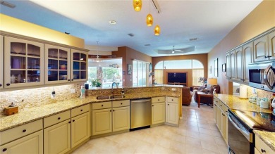 Experience refined Florida living in this meticulously on The Grand Club - Pine Lakes Course in Florida - for sale on GolfHomes.com, golf home, golf lot