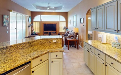 Experience refined Florida living in this meticulously on The Grand Club - Pine Lakes Course in Florida - for sale on GolfHomes.com, golf home, golf lot