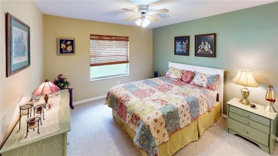 Experience refined Florida living in this meticulously on The Grand Club - Pine Lakes Course in Florida - for sale on GolfHomes.com, golf home, golf lot