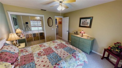 Experience refined Florida living in this meticulously on The Grand Club - Pine Lakes Course in Florida - for sale on GolfHomes.com, golf home, golf lot