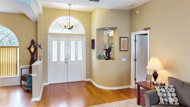 Experience refined Florida living in this meticulously on The Grand Club - Pine Lakes Course in Florida - for sale on GolfHomes.com, golf home, golf lot