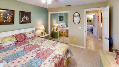 Experience refined Florida living in this meticulously on The Grand Club - Pine Lakes Course in Florida - for sale on GolfHomes.com, golf home, golf lot