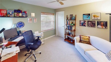 Experience refined Florida living in this meticulously on The Grand Club - Pine Lakes Course in Florida - for sale on GolfHomes.com, golf home, golf lot