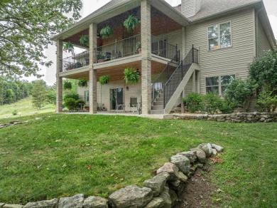 Experience upscale living in Stonebridge Village, one of on Ledgestone Country Club and Golf Course in Missouri - for sale on GolfHomes.com, golf home, golf lot