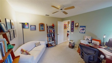 Experience refined Florida living in this meticulously on The Grand Club - Pine Lakes Course in Florida - for sale on GolfHomes.com, golf home, golf lot