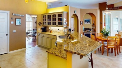 Experience refined Florida living in this meticulously on The Grand Club - Pine Lakes Course in Florida - for sale on GolfHomes.com, golf home, golf lot