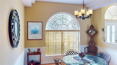 Experience refined Florida living in this meticulously on The Grand Club - Pine Lakes Course in Florida - for sale on GolfHomes.com, golf home, golf lot