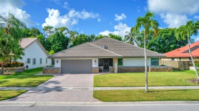 Welcome to your dream home! This updated 4-bedroom, 2.5-bathroom on Boca Lago Golf and Country Club in Florida - for sale on GolfHomes.com, golf home, golf lot