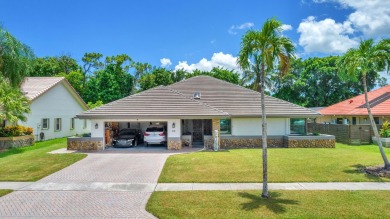 Welcome to your dream home! This updated 4-bedroom, 2.5-bathroom on Boca Lago Golf and Country Club in Florida - for sale on GolfHomes.com, golf home, golf lot