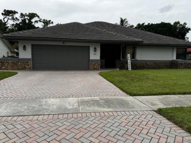 Welcome to your dream home! This updated 4-bedroom, 2.5-bathroom on Boca Lago Golf and Country Club in Florida - for sale on GolfHomes.com, golf home, golf lot