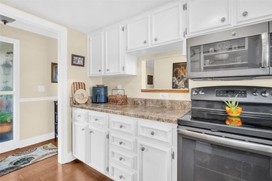 Beautifully updated and move-in ready, this 2-bedroom, 2-bath on Highland Lakes Executive Golf Course in Florida - for sale on GolfHomes.com, golf home, golf lot