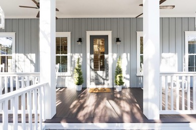 A true elevated Lowcountry retreat tucked away on a quiet cul de on Charleston National Golf Club in South Carolina - for sale on GolfHomes.com, golf home, golf lot