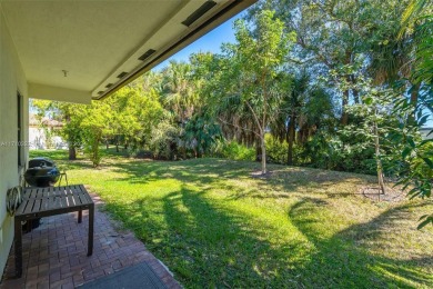 Gorgeous one story home with 3 bright/airy bedrooms 2 bathrooms on Woodlands Country Club in Florida - for sale on GolfHomes.com, golf home, golf lot