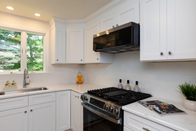 This turnkey home has been thoughtfully updated throughout on The Golf Club At Southport in Massachusetts - for sale on GolfHomes.com, golf home, golf lot