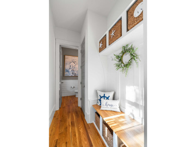 A true elevated Lowcountry retreat tucked away on a quiet cul de on Charleston National Golf Club in South Carolina - for sale on GolfHomes.com, golf home, golf lot