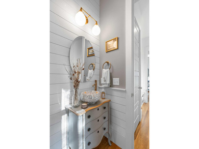 A true elevated Lowcountry retreat tucked away on a quiet cul de on Charleston National Golf Club in South Carolina - for sale on GolfHomes.com, golf home, golf lot