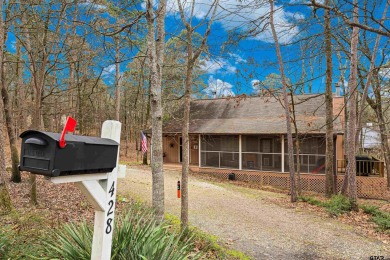 Enjoy this darling 2 bedroom & 2 bath home on two lots with two on Holly Lake Ranch Golf Club in Texas - for sale on GolfHomes.com, golf home, golf lot