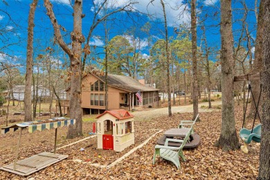 Enjoy this darling 2 bedroom & 2 bath home on two lots with two on Holly Lake Ranch Golf Club in Texas - for sale on GolfHomes.com, golf home, golf lot