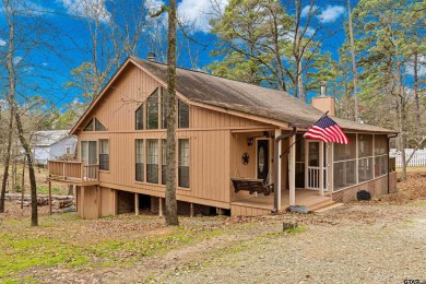 Enjoy this darling 2 bedroom & 2 bath home on two lots with two on Holly Lake Ranch Golf Club in Texas - for sale on GolfHomes.com, golf home, golf lot