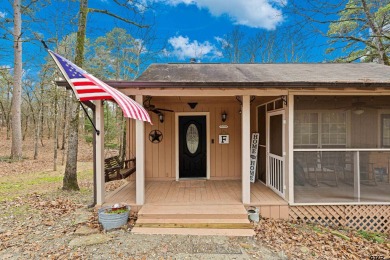 Enjoy this darling 2 bedroom & 2 bath home on two lots with two on Holly Lake Ranch Golf Club in Texas - for sale on GolfHomes.com, golf home, golf lot