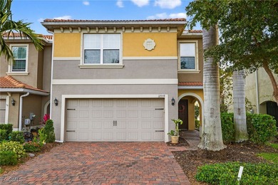 Come see this RARE end unit town home with exceptional lake AND on Gateway Golf and Country Club in Florida - for sale on GolfHomes.com, golf home, golf lot