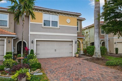 Come see this RARE end unit town home with exceptional lake AND on Gateway Golf and Country Club in Florida - for sale on GolfHomes.com, golf home, golf lot