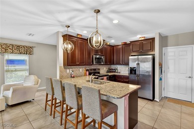 Come see this RARE end unit town home with exceptional lake AND on Gateway Golf and Country Club in Florida - for sale on GolfHomes.com, golf home, golf lot