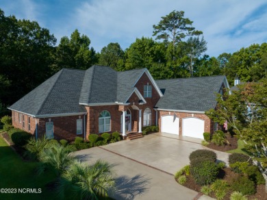 Located on a quiet, secluded cul de sac, this beautiful brick on Founders Club At St. James Plantation in North Carolina - for sale on GolfHomes.com, golf home, golf lot