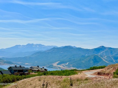 Stunning downhill building lot with magnificent 180 degree views on Talisker Club At Tuhaye in Utah - for sale on GolfHomes.com, golf home, golf lot