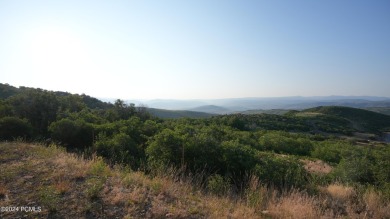 Stunning downhill building lot with magnificent 180 degree views on Talisker Club At Tuhaye in Utah - for sale on GolfHomes.com, golf home, golf lot