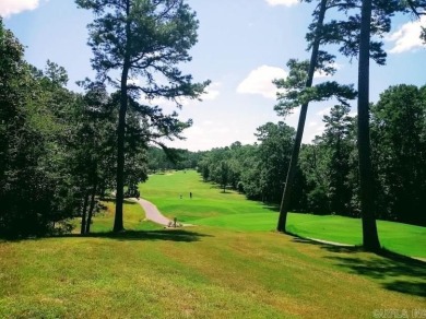 Check out this beautifully wooded, gently sloped lot on the on Ponce De Leon Golf Course in Arkansas - for sale on GolfHomes.com, golf home, golf lot