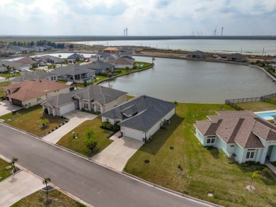 15 Arcos Gardens is a stunning 3-bedroom, 2-bathroom home with on South Padre Island Golf Club in Texas - for sale on GolfHomes.com, golf home, golf lot