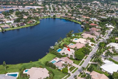 This exceptional lakeside estate blends sophistication, comfort on Bocaire Country Club in Florida - for sale on GolfHomes.com, golf home, golf lot